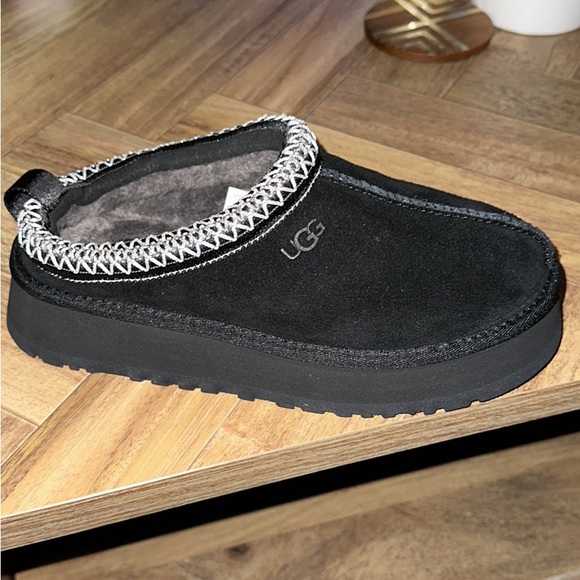 Ugg Tazz. New. Never worn. In box. Size 7